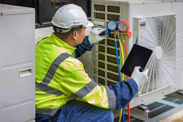 Professional Heat Pump Repair technician working in Eldorado, IL